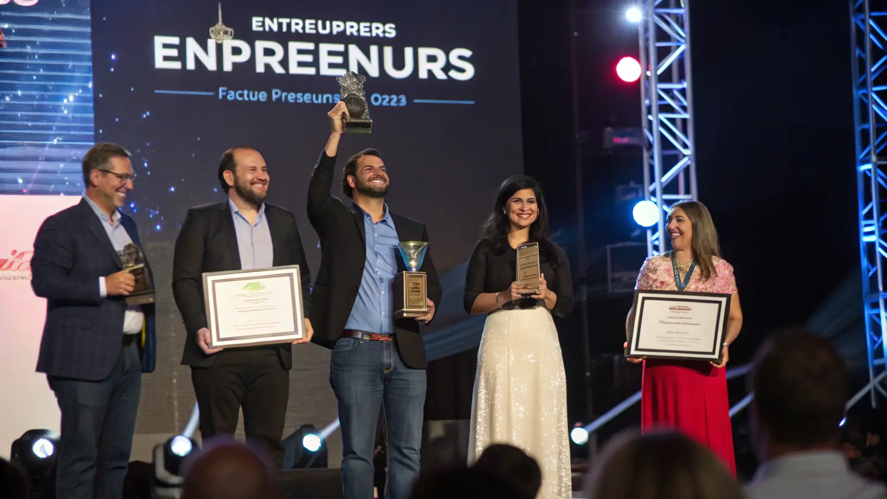 A photo of the FOYER DU MARIN B.A.N. team receiving an award for their contributions to the community, highlighting their positive impact and recognition.